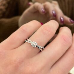 CRISS-CROSS SOLITAIRE RING